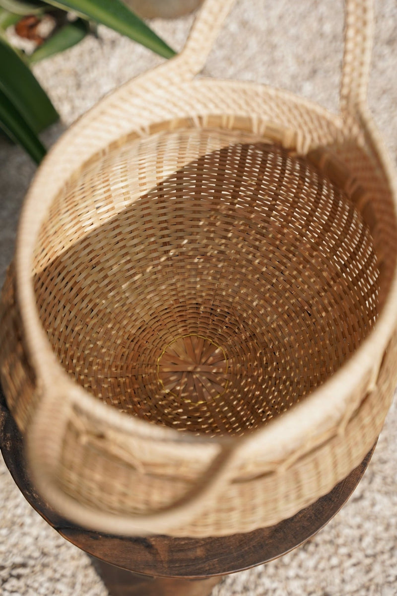 Gevlochten mand- The Bamboo Basket